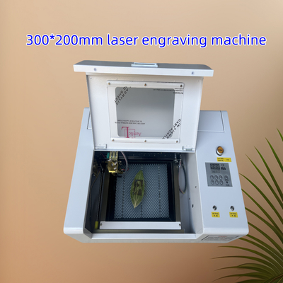 3020 300*200 মিমি সিএনসি সিও 2 লেজার গ্রাভার অ্যাক্রিলিক কাঠের চামড়া টেক্সটাইলের জন্য